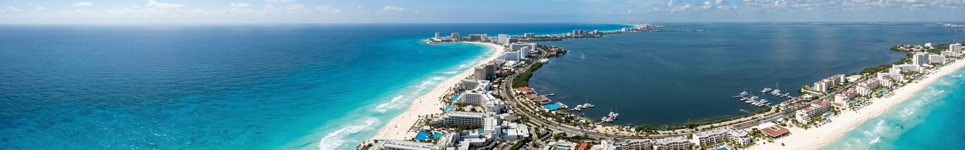 Cancun Hotel Zone beach with turquoise water and resort hotels