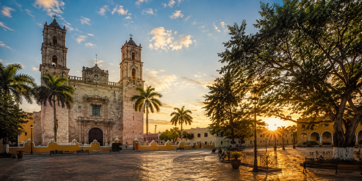 Colonial main square of Valladolid with the San Servacio church and pastel buildings